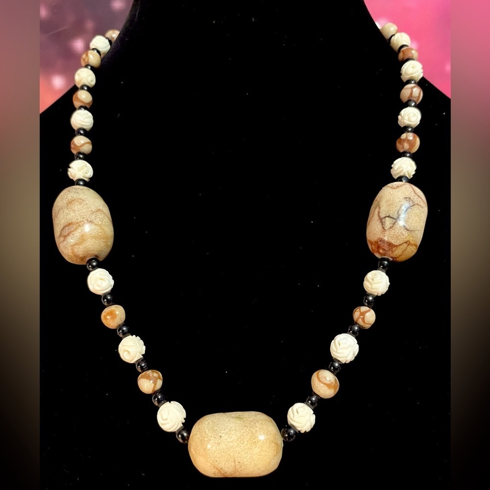 Carved stone bead necklace​​